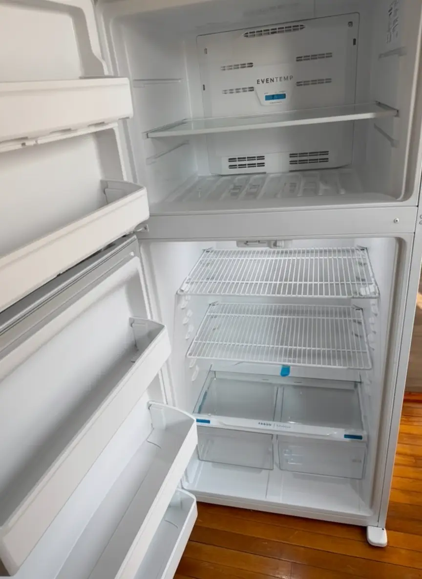 Clean empty refrigerator ready for a move-in after a Trustyclean move-out clean