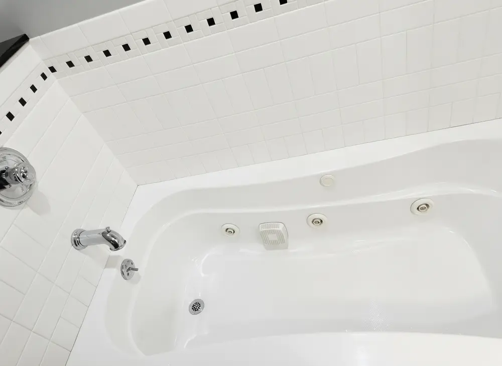 Bright, spotless jetted tub after a Trustyclean deep clean
